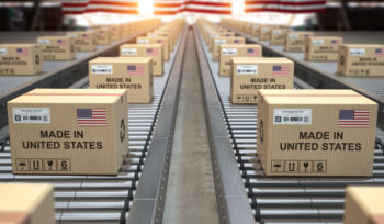 Cardboard boxes with text made in USA and american flag on the roller conveyor. 3d illustration